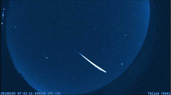 quadrantid meteor streaks against the sky in January