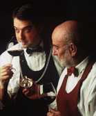 sommeliers tasting a red wine