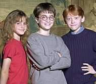 a young Emma Watson, Daniel Radcliffe, and Rupert Grint